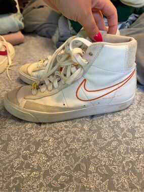 Nike First Use Cream White High-Top Sneakers with Yellow and Orange Accents